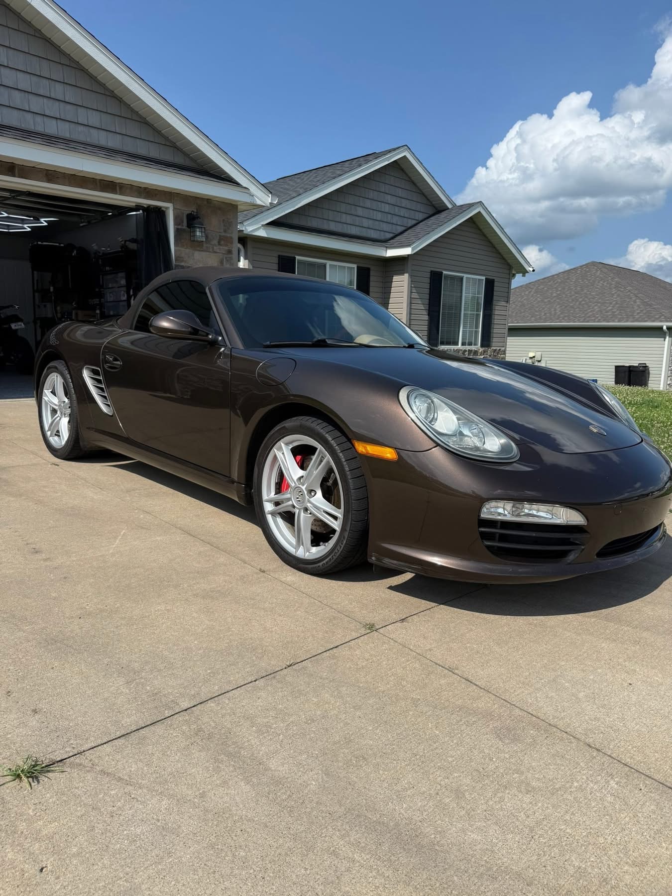 Brown Porsche roadster photographed outdoors from the Clean Sweep Detailing portfolio